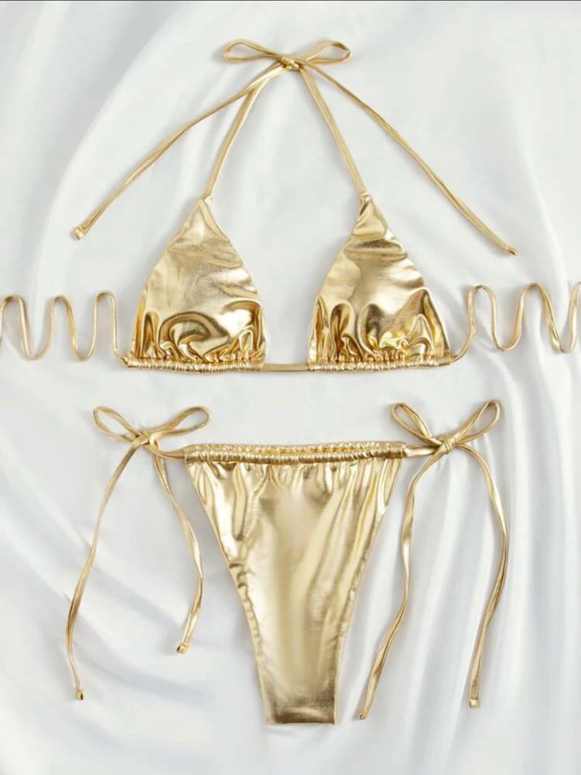 The Metallic gold swim bikini with tie sides and solid metallic gold print triangle halter top tie and bottoms swimsuit set
