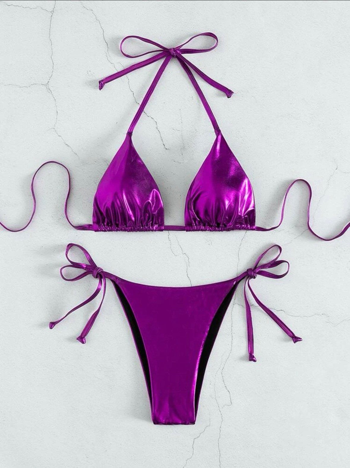 The Metallic purple swim bikini with tie sides and solid metallic purple print triangle halter top tie and bottoms swimsuit set