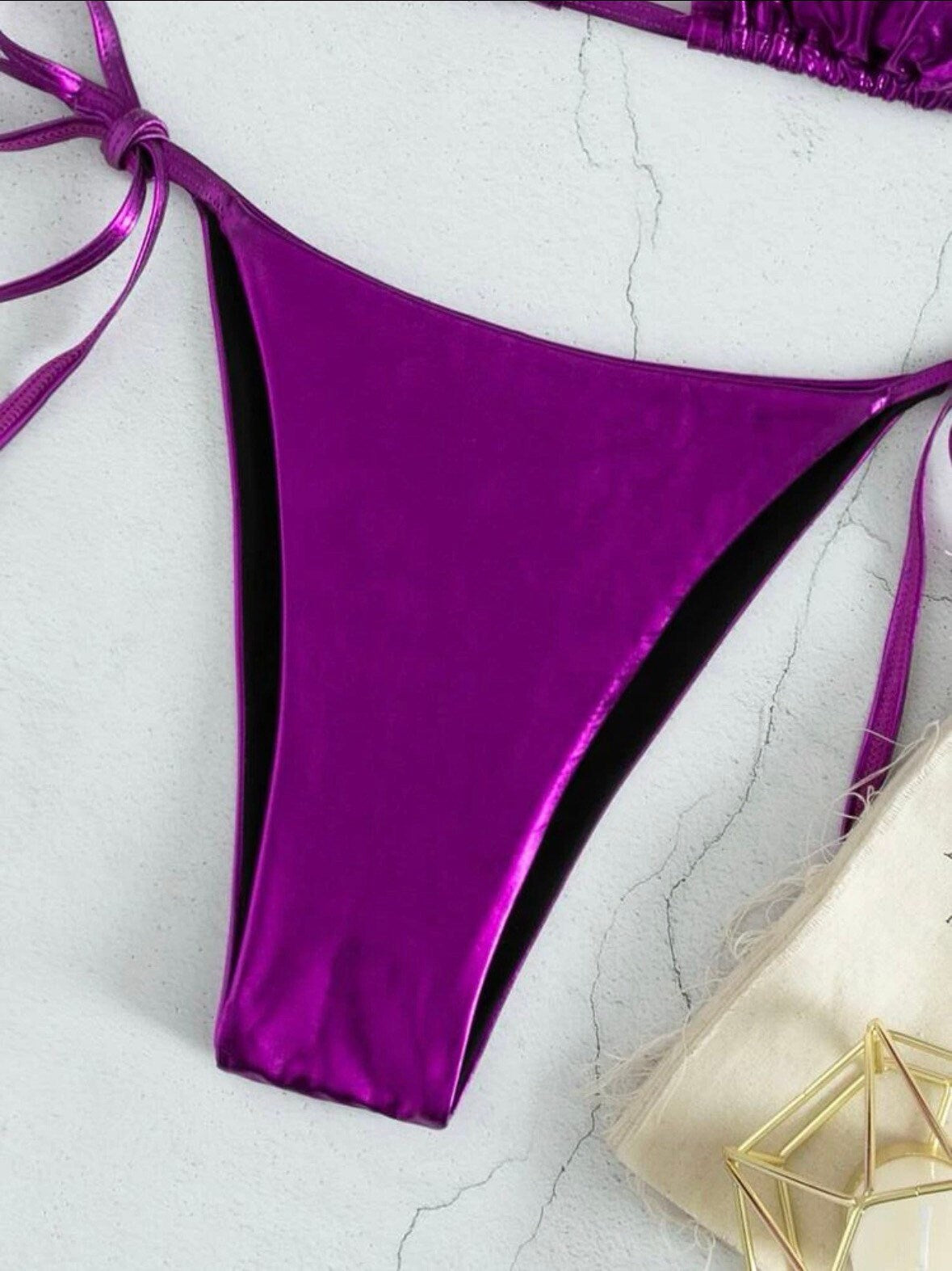 The Metallic purple swim bikini with tie sides and solid metallic purple print triangle halter top tie and bottoms swimsuit set