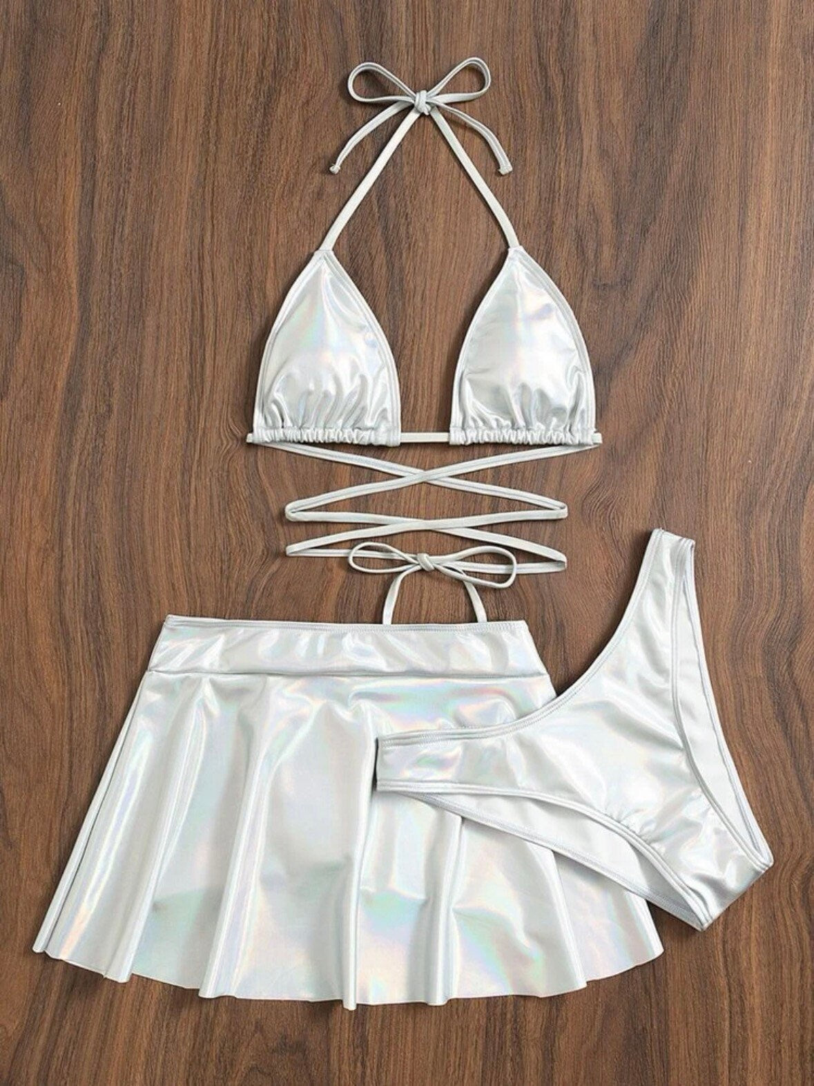 The Metallic silver swim bikini with beach skirt and solid metallic silver print triangle halter top tie and bottoms swimsuit 3 piece set
