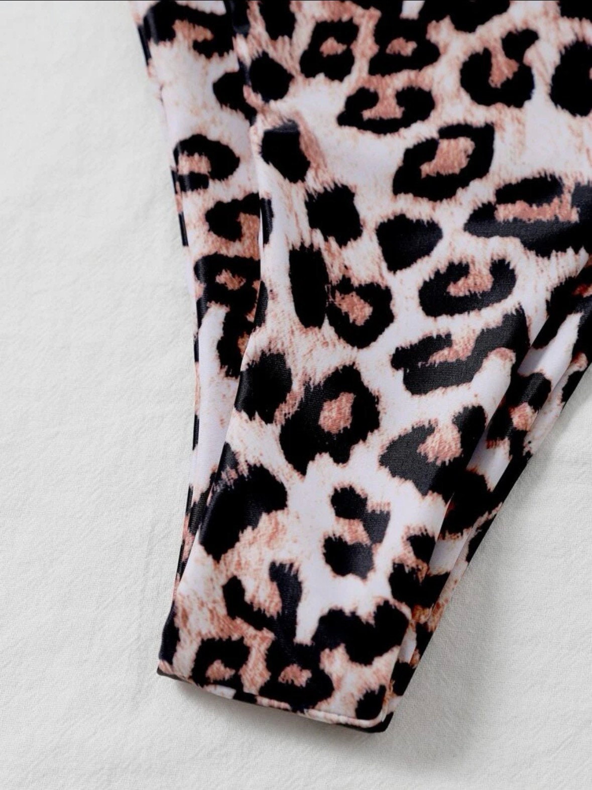 The LauLau Leopard Criss Cross Tie Around thong bikini leopard cheetah print details triangle top tie and bottoms swimsuit set
