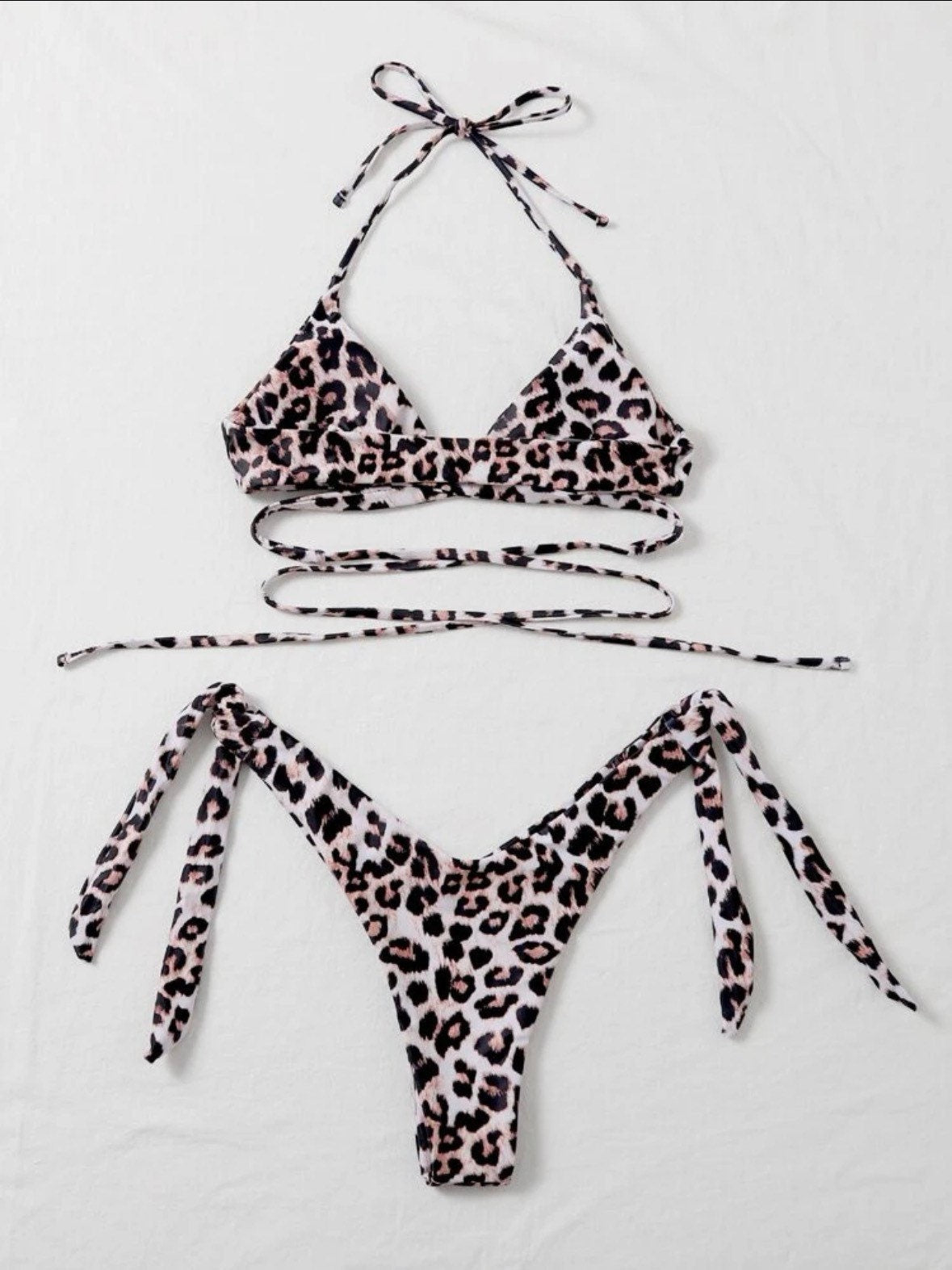 The LauLau Leopard Criss Cross Tie Around thong bikini leopard cheetah print details triangle top tie and bottoms swimsuit set