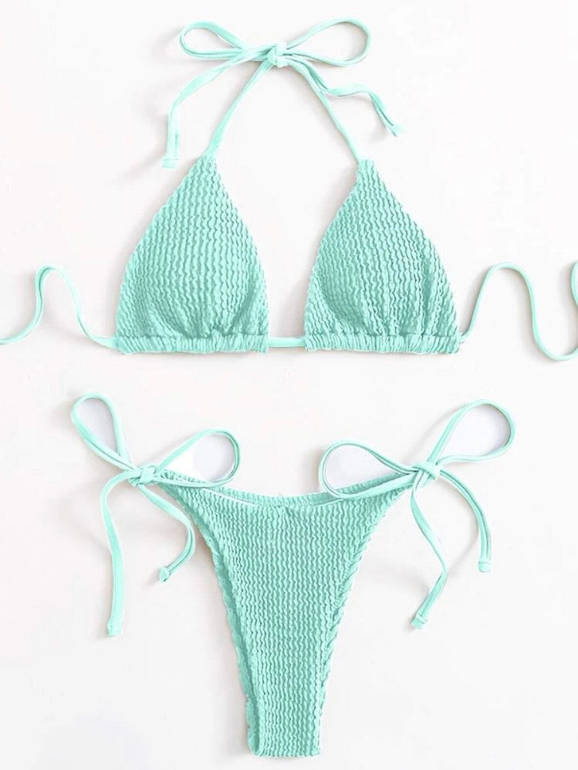 The Sea Green bikini and thong bottoms with tie sides and textured details triangle halter top tie and bottoms swimsuit set