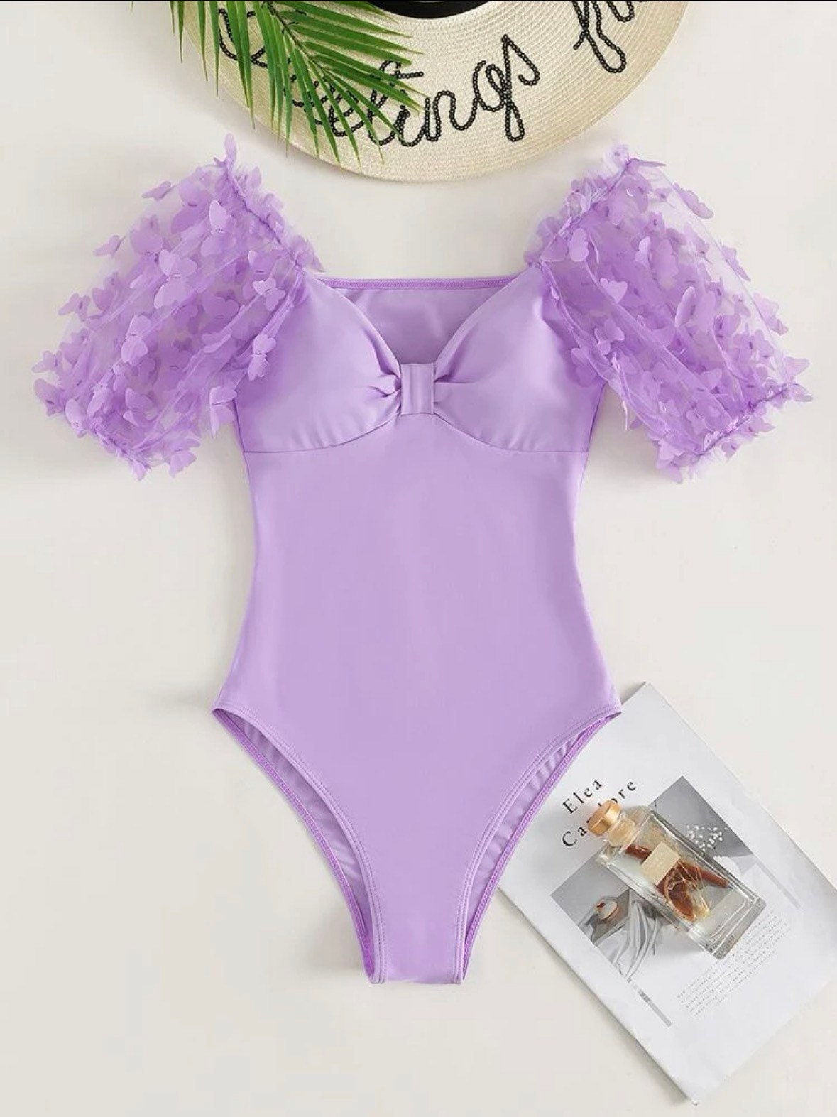 The Beautiful Butterfly Shoulder One Piece Swimsuit with an elegant wireless ruched detail cutout halter one piece swimsuit